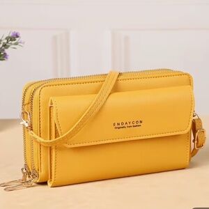 NEW: Yellow Women's crossbody wallet/bag in dust bag